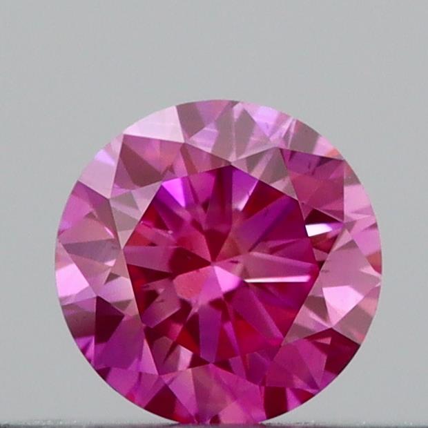 Actual 0.21 carat Vivid Pink Round lab-grown diamond