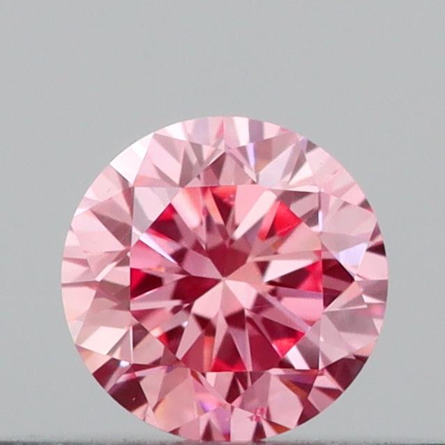 Actual 0.21 carat Vivid Pink Round lab-grown diamond