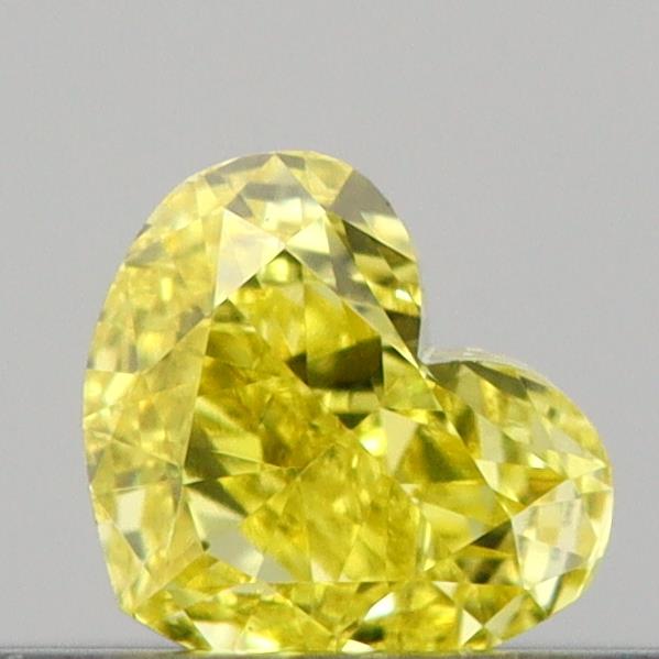 Actual 0.16 carat Vivid Yellow Heart lab-grown diamond