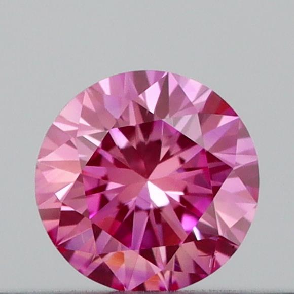 Actual 0.17 carat Vivid Pink Round lab-grown diamond