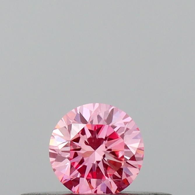 Actual 0.17 carat Vivid Pink Round lab-grown diamond