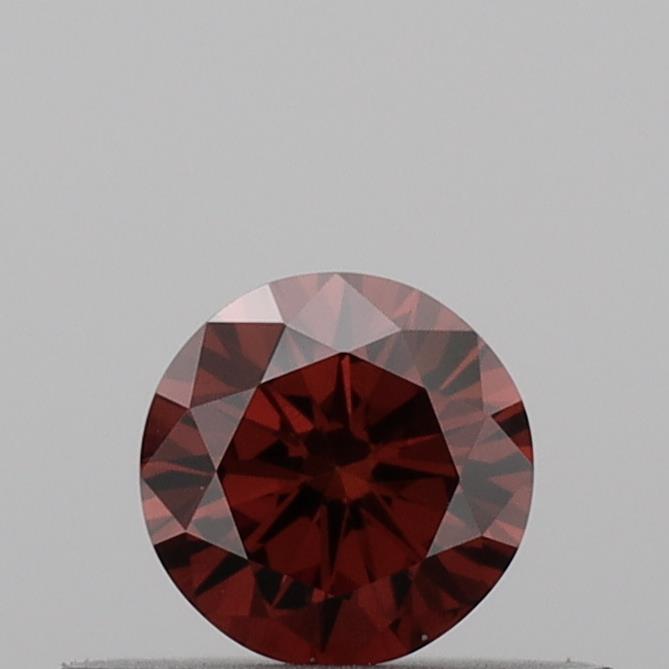 Actual 0.28 carat Vivid Orange Round lab-grown diamond
