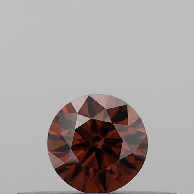 Actual 0.19 carat Vivid Orange Round lab-grown diamond