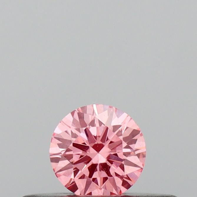 Actual 0.16 carat Vivid Pink Round lab-grown diamond