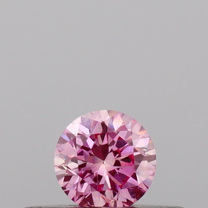Actual 0.17 carat Vivid Pink Round lab-grown diamond