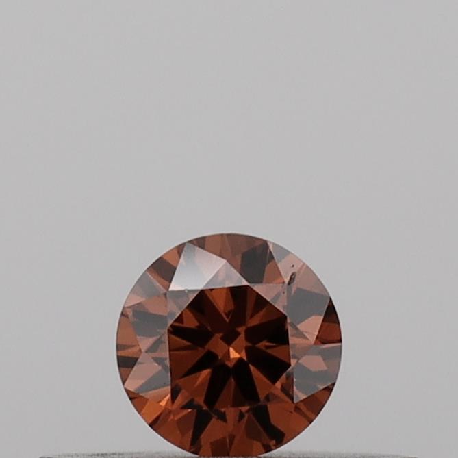 Actual 0.16 carat Vivid Orange Round lab-grown diamond