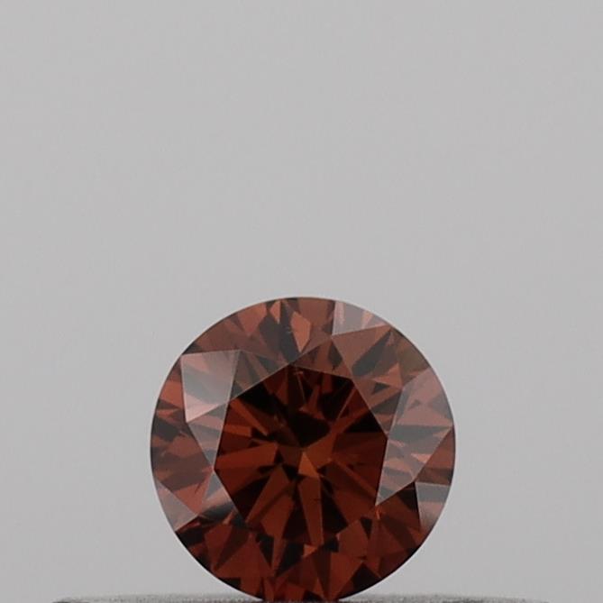 Actual 0.18 carat Vivid Orange Round lab-grown diamond