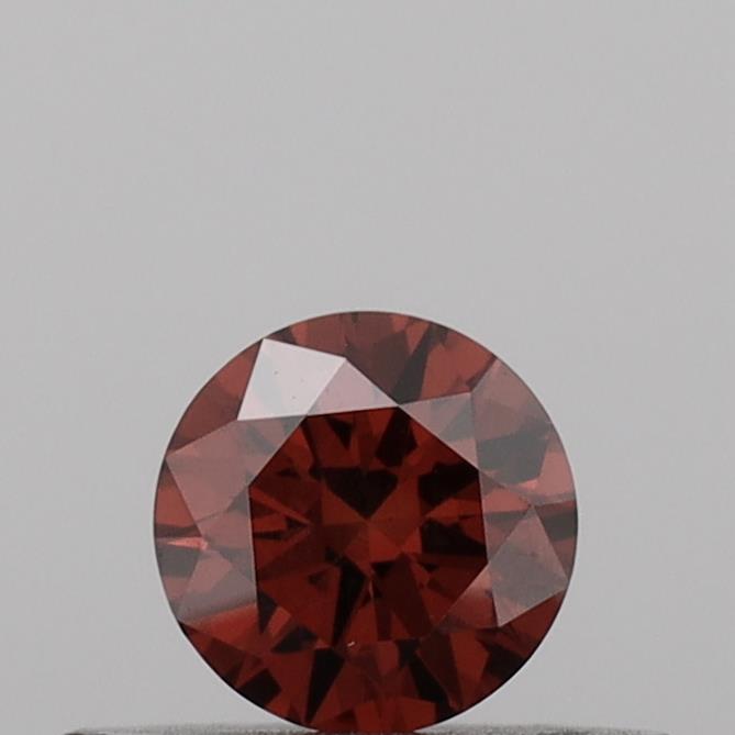 Actual 0.26 carat Vivid Orange Round lab-grown diamond