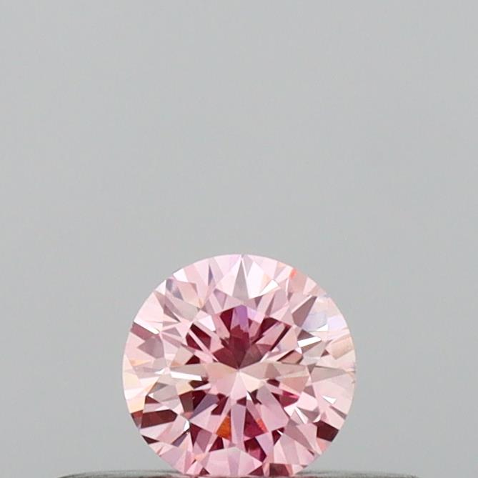 Actual 0.16 carat Vivid Pink Round lab-grown diamond