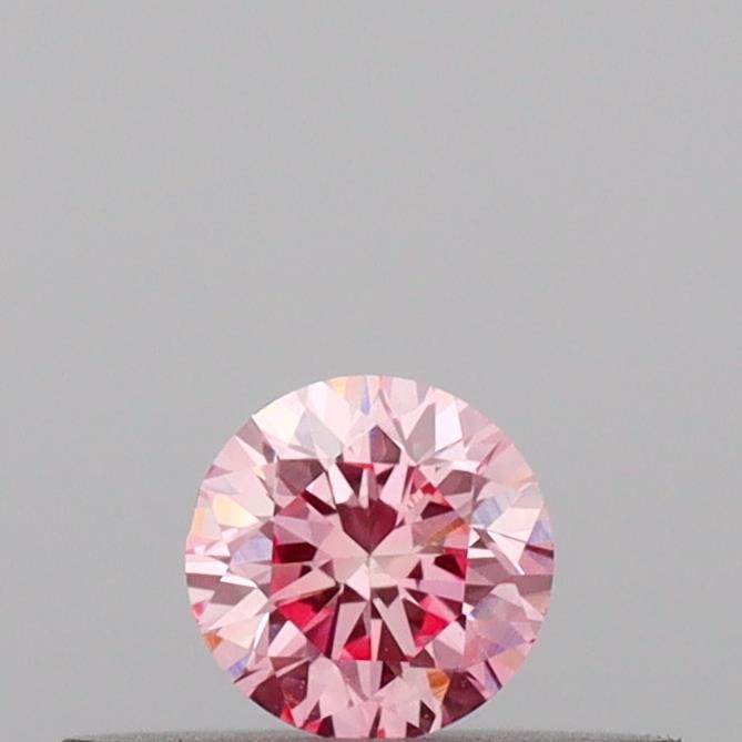 Actual 0.17 carat Vivid Pink Round lab-grown diamond