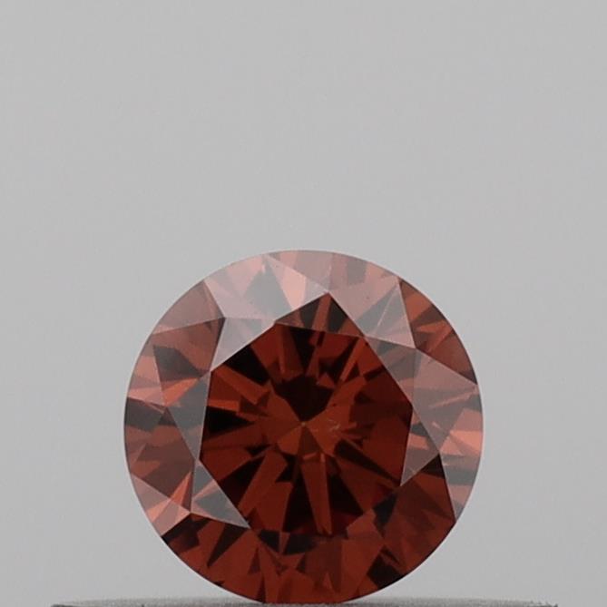 Actual 0.28 carat Vivid Orange Round lab-grown diamond