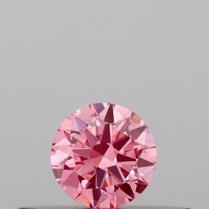 Actual 0.17 carat Vivid Pink Round lab-grown diamond