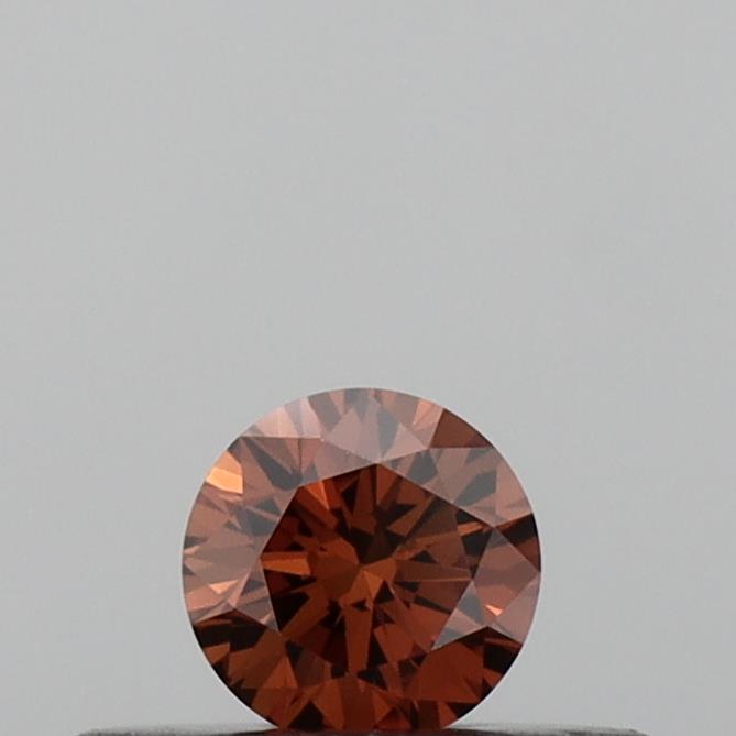 Actual 0.17 carat Vivid Orange Round lab-grown diamond
