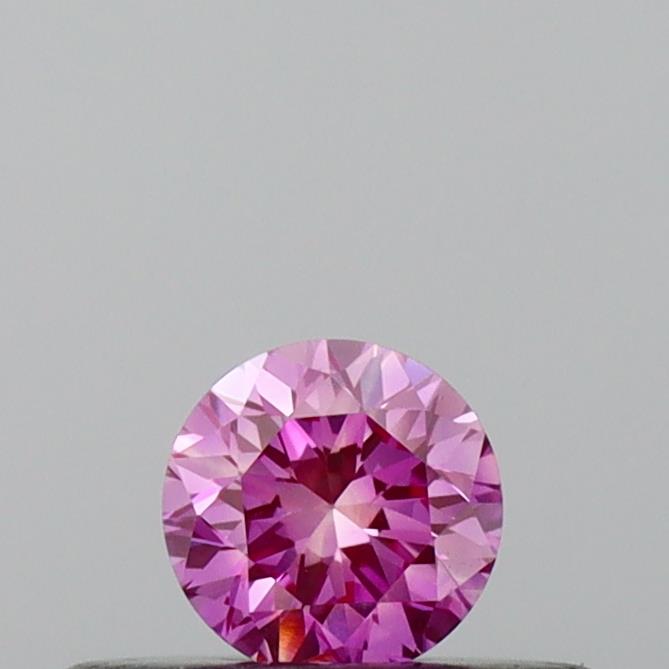 Actual 0.21 carat Vivid Pink Round lab-grown diamond
