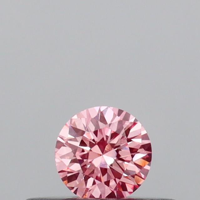 Actual 0.17 carat Vivid Pink Round lab-grown diamond