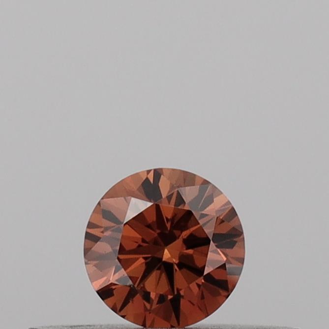 Actual 0.16 carat Vivid Orange Round lab-grown diamond