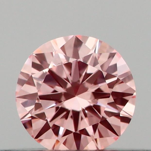 Actual 0.2 carat Vivid Pink Round lab-grown diamond