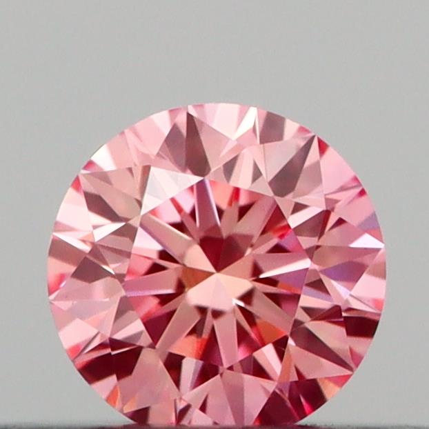 Actual 0.2 carat Vivid Pink Round lab-grown diamond
