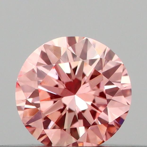 Actual 0.2 carat Vivid Pink Round lab-grown diamond