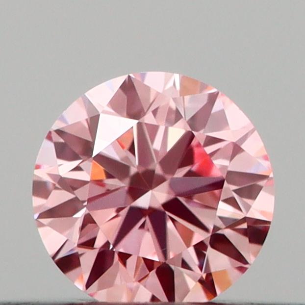 Actual 0.2 carat Vivid Pink Round lab-grown diamond