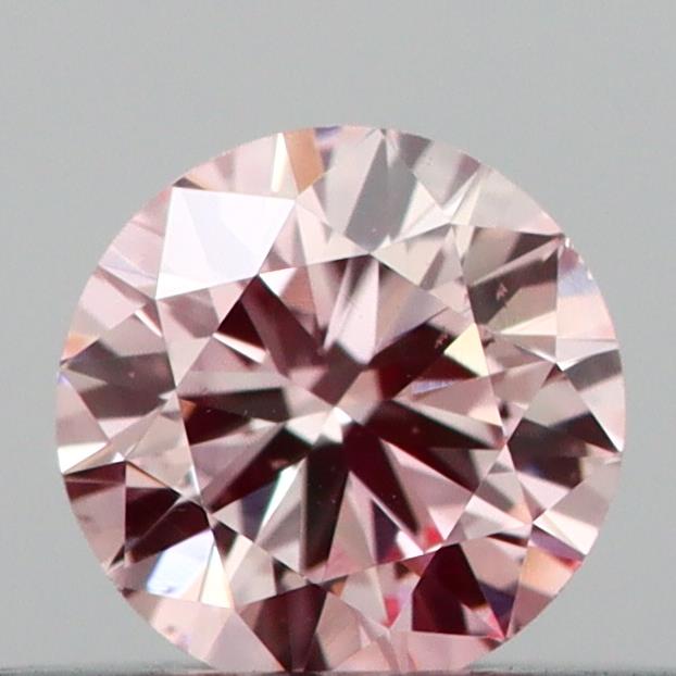 Actual 0.23 carat Intense Pink Round lab-grown diamond
