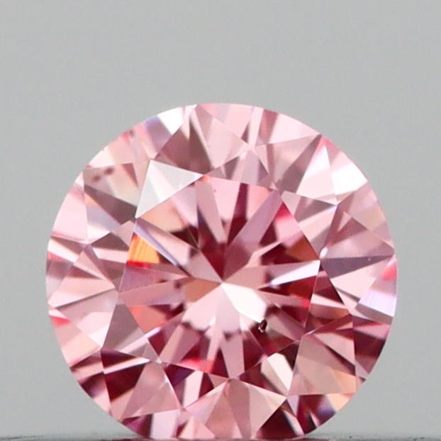 Actual 0.21 carat Vivid Pink Round lab-grown diamond