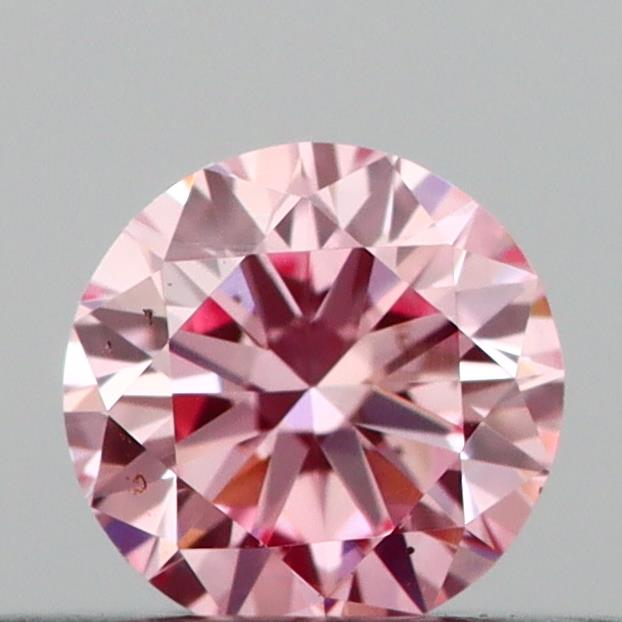 Actual 0.2 carat Vivid Pink Round lab-grown diamond