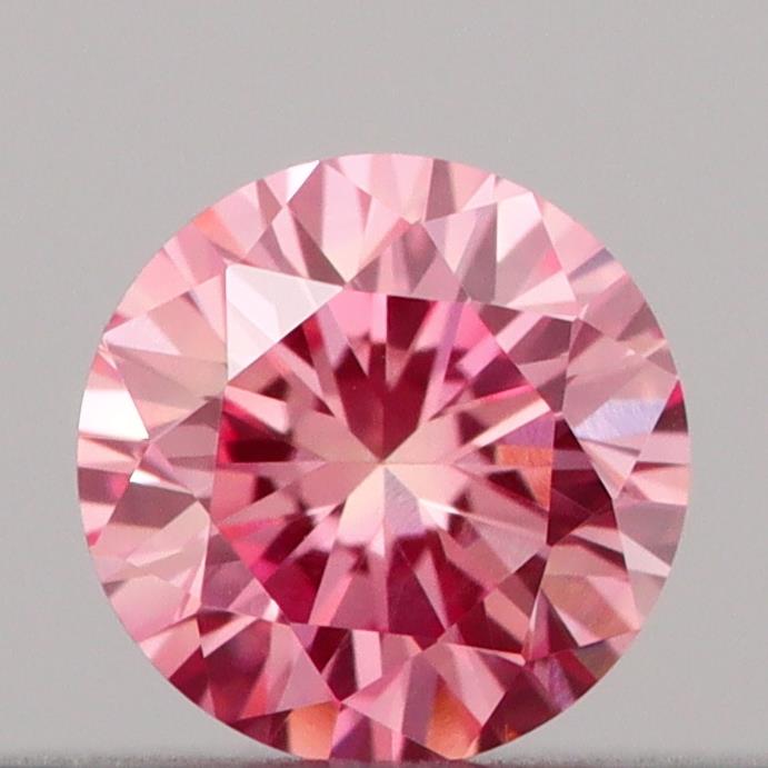Actual 0.18 carat Vivid Pink Round lab-grown diamond