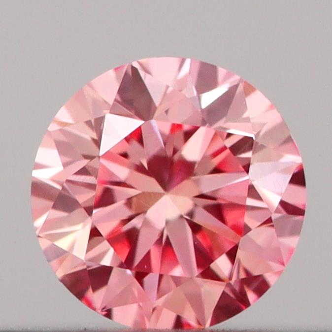 Actual 0.18 carat Vivid Pink Round lab-grown diamond