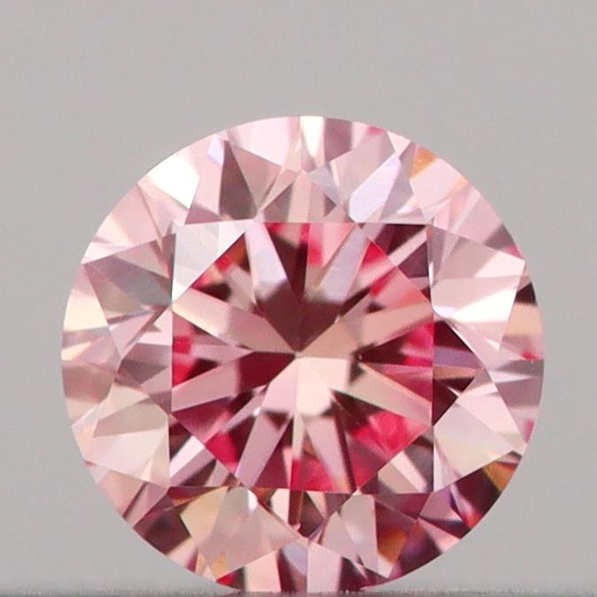 Actual 0.17 carat Vivid Pink Round lab-grown diamond