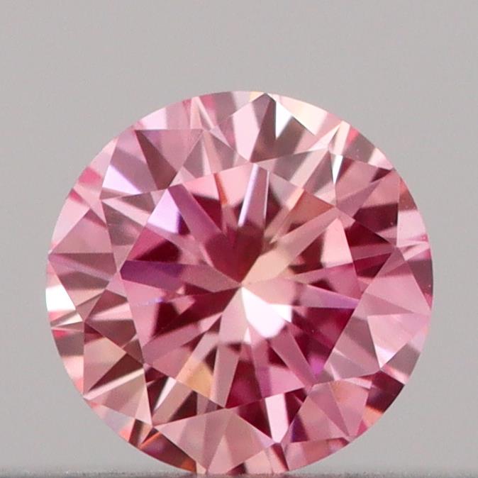Actual 0.16 carat Vivid Pink Round lab-grown diamond