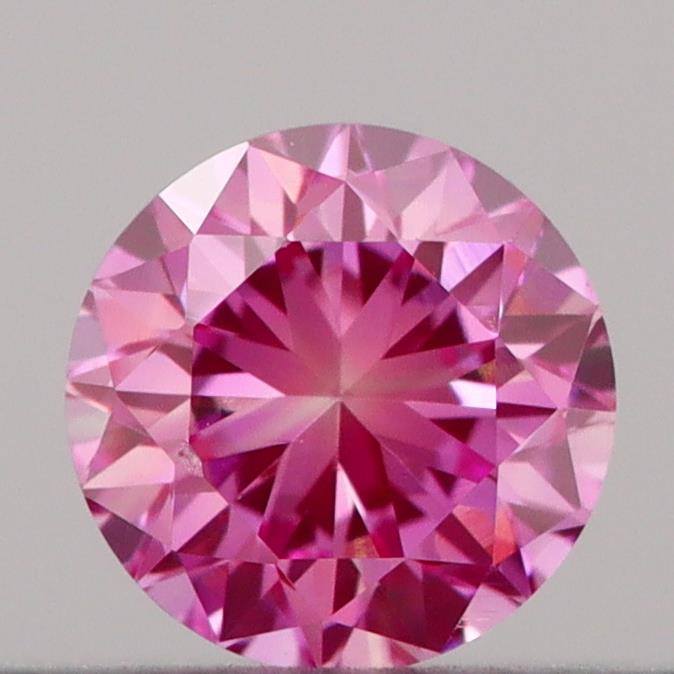 Actual 0.18 carat Vivid Pink Round lab-grown diamond