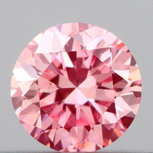 Actual 0.19 carat Vivid Pink Round lab-grown diamond