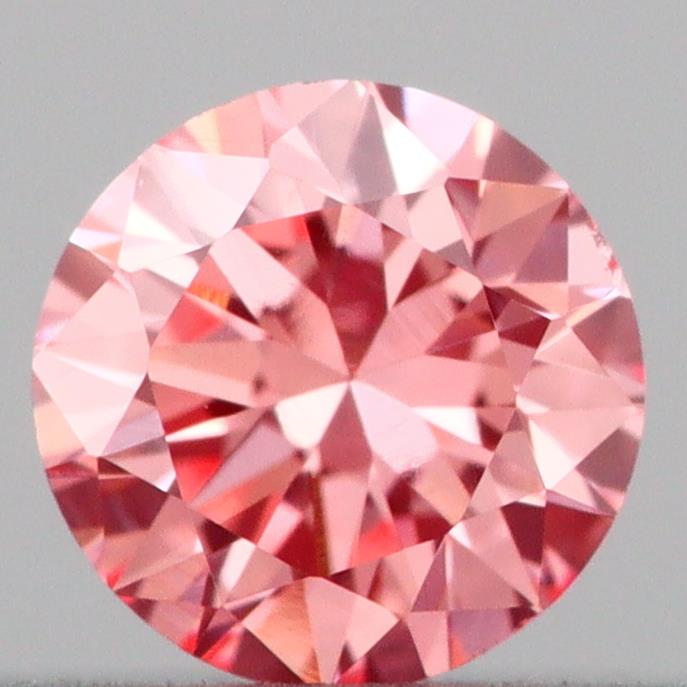 Actual 0.17 carat Vivid Pink Round lab-grown diamond