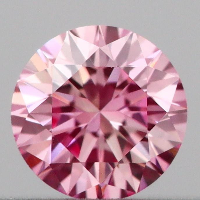 Actual 0.17 carat Intense Pink Round lab-grown diamond