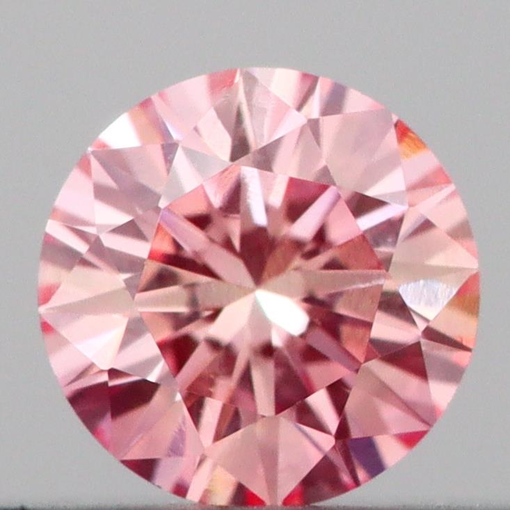 Actual 0.19 carat Intense Pink Round lab-grown diamond