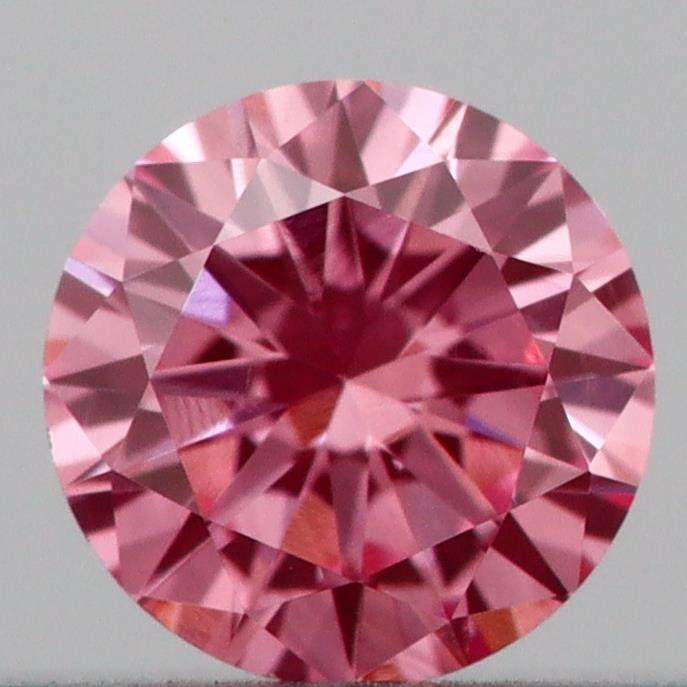 Actual 0.16 carat Vivid Pink Round lab-grown diamond