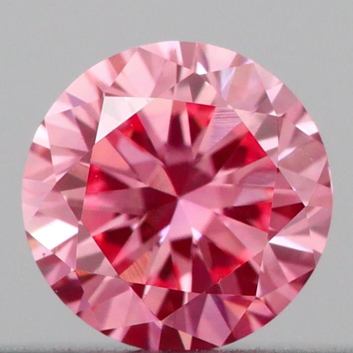 Actual 0.18 carat Vivid Pink Round lab-grown diamond
