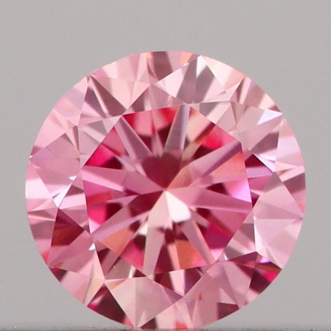 Actual 0.18 carat Vivid Pink Round lab-grown diamond