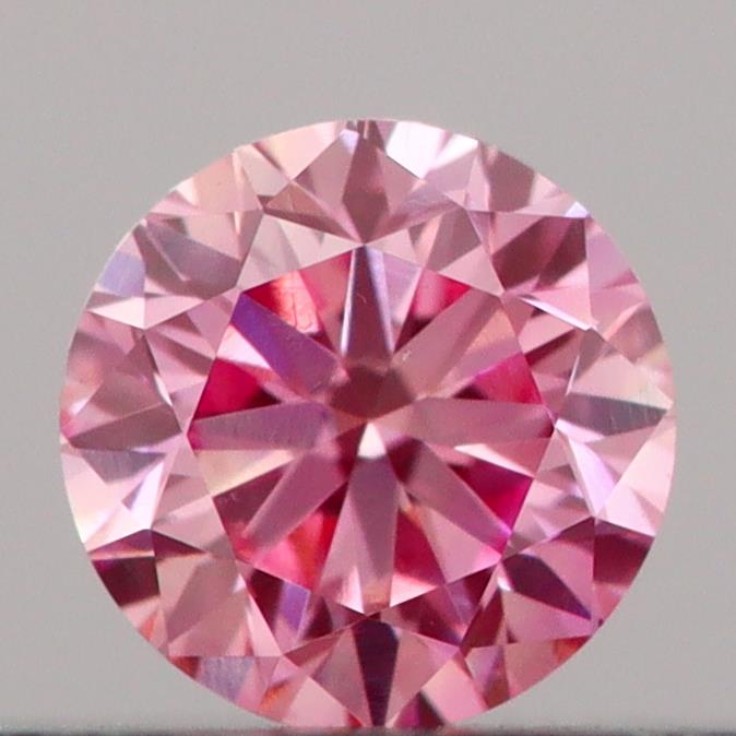 Actual 0.2 carat Vivid Pink Round lab-grown diamond