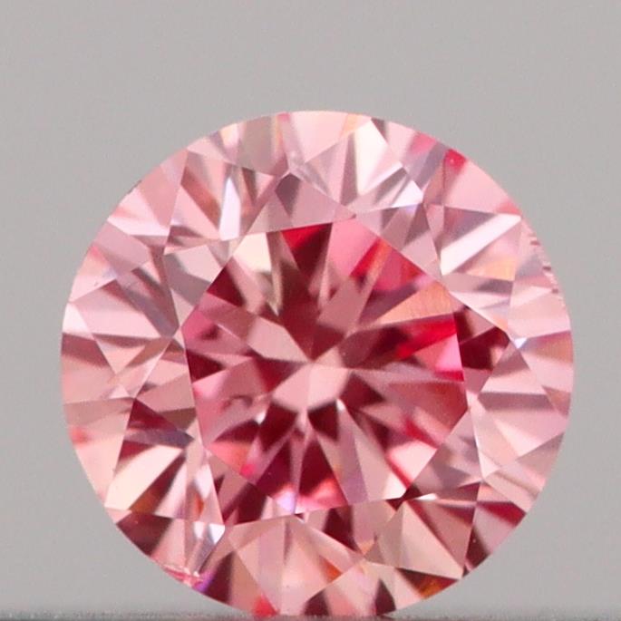 Actual 0.18 carat Vivid Pink Round lab-grown diamond
