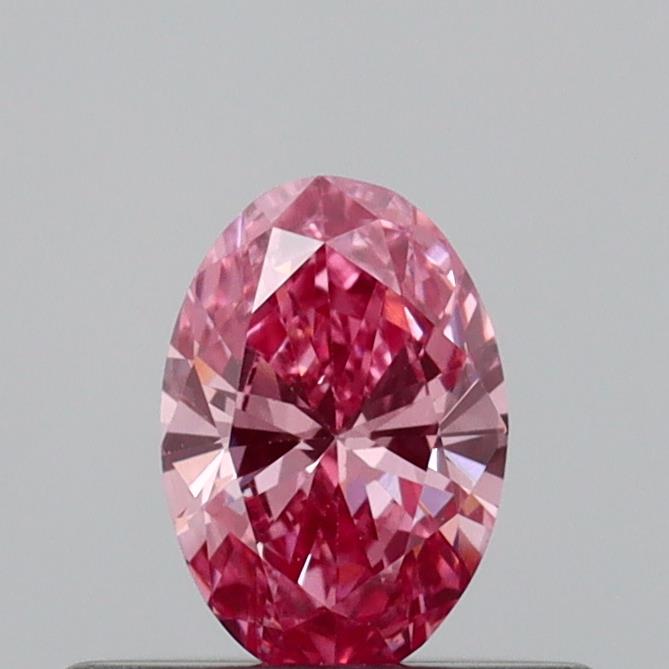 Actual 0.29 carat Vivid Pink Oval lab-grown diamond