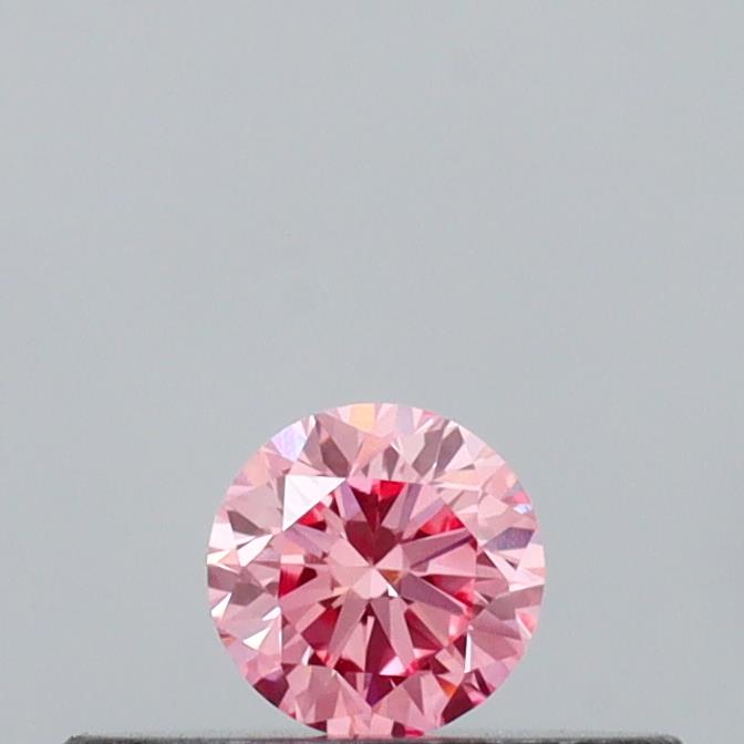 Actual 0.13 carat Vivid Pink Round lab-grown diamond