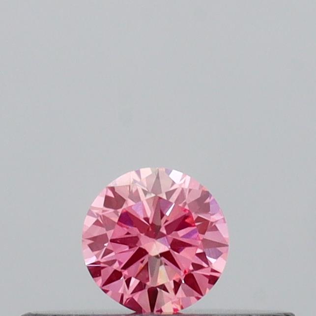 Actual 0.12 carat Vivid Pink Round lab-grown diamond
