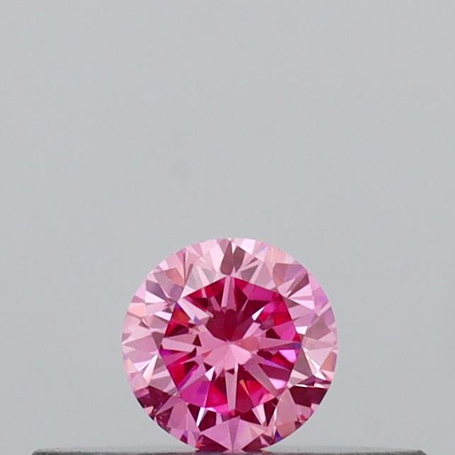 Actual 0.13 carat Vivid Pink Round lab-grown diamond