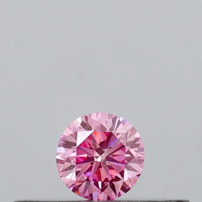 Actual 0.11 carat Vivid Pink Round lab-grown diamond