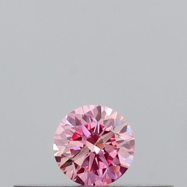 Actual 0.11 carat Intense Pink Round lab-grown diamond