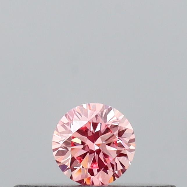 Actual 0.12 carat Intense Pink Round lab-grown diamond