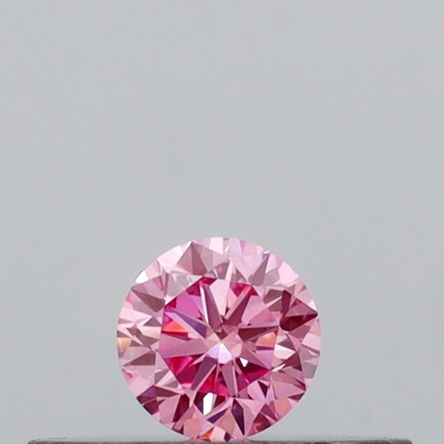 Actual 0.13 carat Vivid Pink Round lab-grown diamond