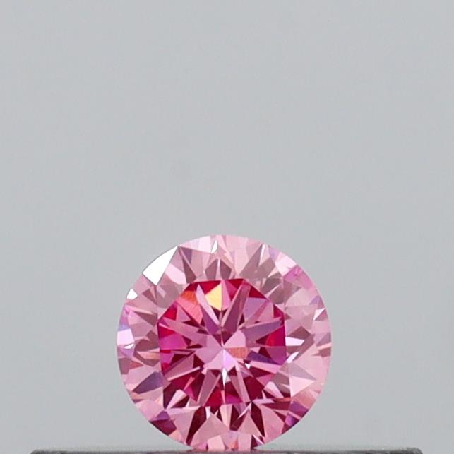 Actual 0.14 carat Vivid Pink Round lab-grown diamond